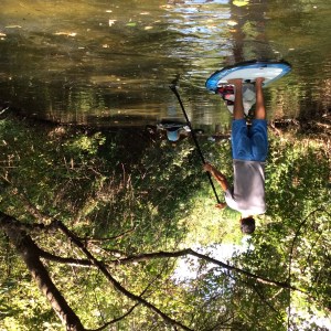 man kayaking in nature