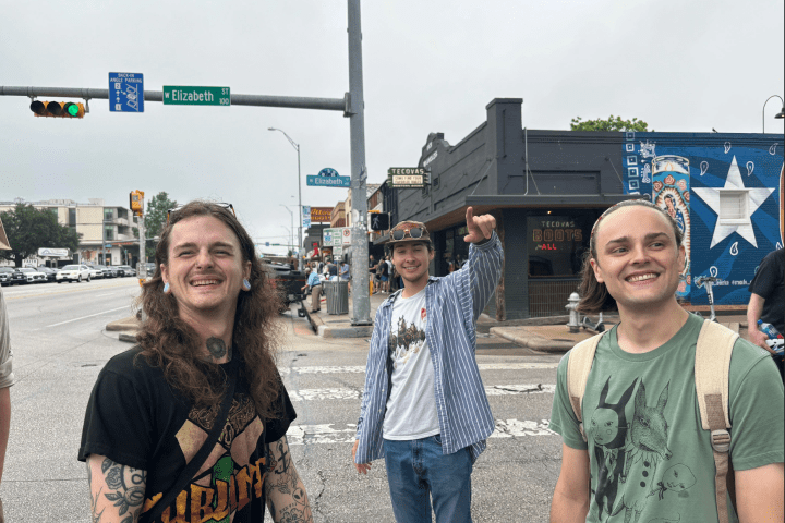a couple of people that are standing in the street